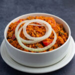 Garifotor recipe made with Sedeli Foods Jollof Sauce and corned beef