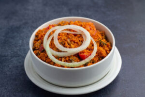 Garifotor recipe made with Sedeli Foods Jollof Sauce and corned beef